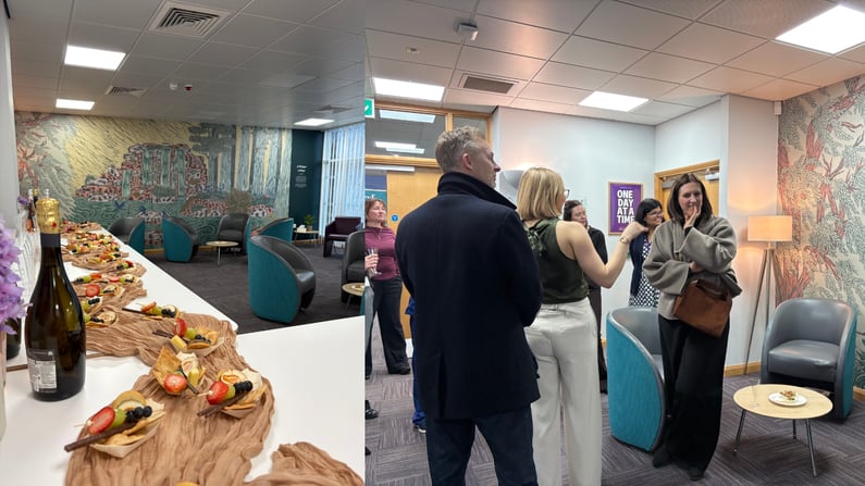 Guests attending the NTU Graphic Design partnership event at our Nottingham fertility clinic beside the mural installation.